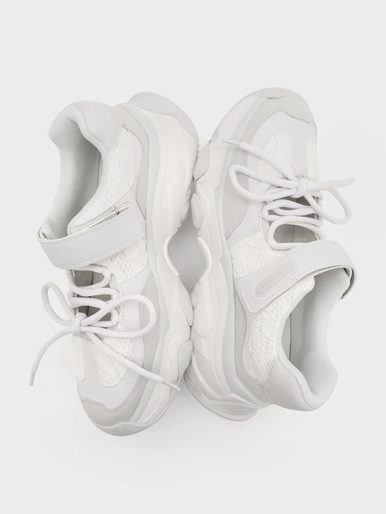 White sneakers are a good business casual shoe option, especially for relaxed work settings - CHARLES & KEITH